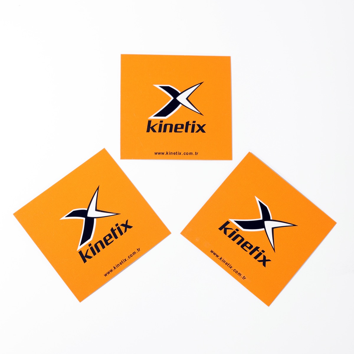 Kinetix — square swing tags printed two colors on coated board with rounded corners