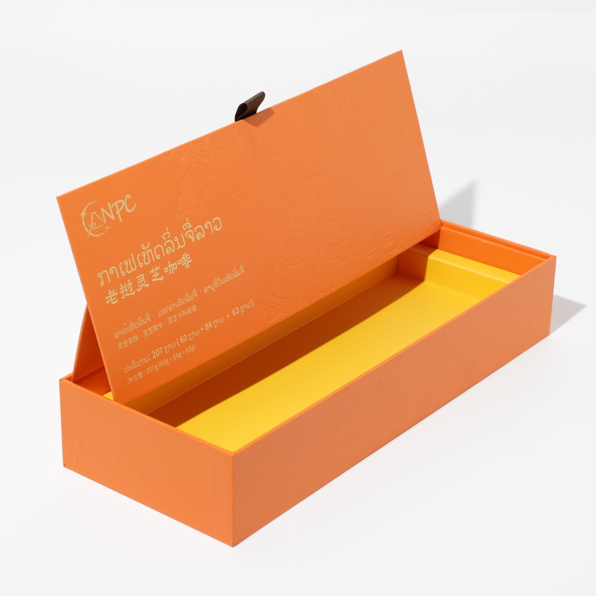 LANPC Laos Reishi Coffee — orange rigid hinged-lid box with tone-on-tone embossing and trilingual gold foil